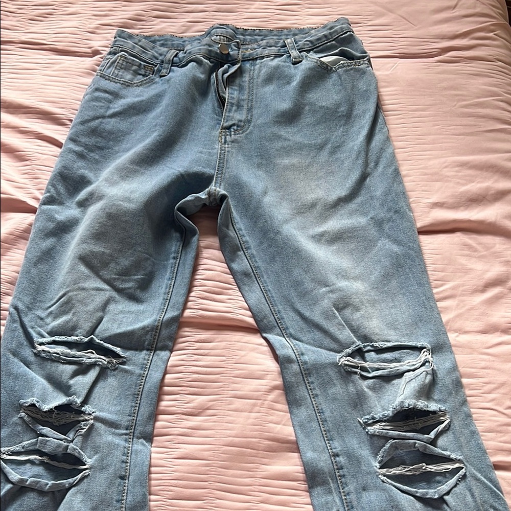 Distressed Light Blue Jeans